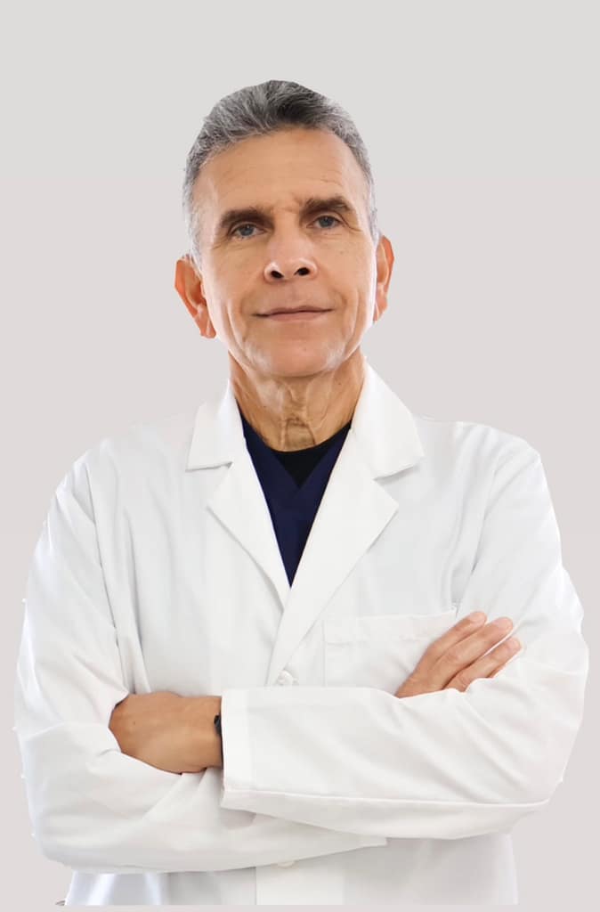 Portrait of dentist Dr. Jorge Ramos with a welcoming gentle smile